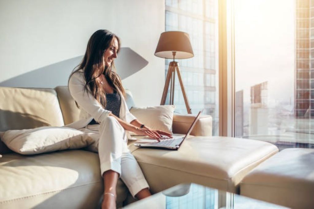 Elegant woman enjoying a luxury lifestyle on a budget, showcasing affordable fashion and stylish home décor