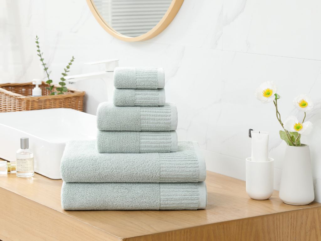 Soft luxury towels hanging in modern bathroom with elegant design