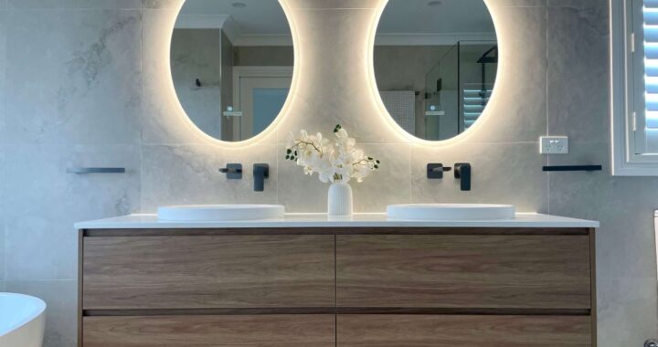 Luxury LED bathroom mirror illuminating a modern vanity with elegant lighting