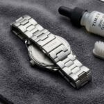 Cleaning a Timex Tribute stainless steel watch with microfiber cloth