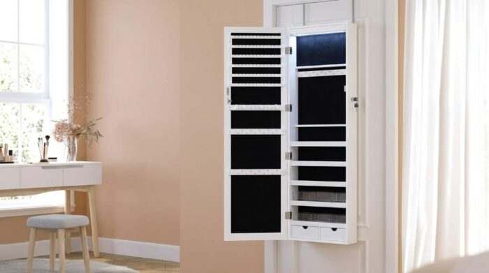 Neatly arranged rings and bracelets inside a jewelry cabinet