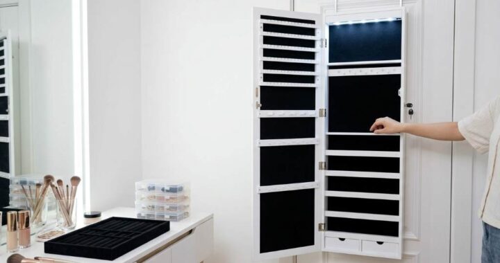 Songmics LED Jewelry Cabinet with organized necklaces and earrings